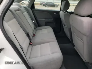 2005 Ford Five Hundred SE z VIN 1FAFP231X5G165841, wystawiony jako Copart lot #43117535 z przebiegiem 154 874 mil mil oraz Czysty tytuł • Clean title. Historia ofert i sprzedaży dostępna na DreamBid. Obrazek 10.