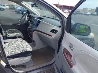 2011 Toyota Sienna XLE AAS with VIN 5TDYK3DC3BS059501, listed as a IAAI auction lot 42185225 with 143,416 mi miles. Bid and sale history available at carsss.com. Image 5.