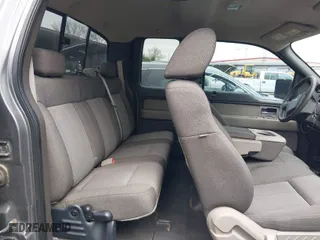 2009 Ford F-150 STX with VIN 1FTRX14869FA09093, listed as a IAAI auction lot 41921152 with 173,744 mi miles. Bid and sale history available at carsss.com. Image 8.