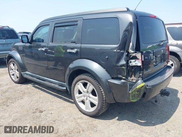 2011 Dodge Nitro Heat with VIN 1D4PU4GK2BW576743, listed as a IAAI auction lot 42383114 with 129,696 mi miles and . Bid and sale history available at DreamBid. Image 3.