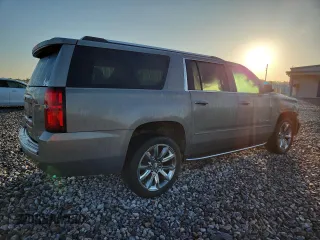 2019 Chevrolet Suburban LT with VIN 1GNSCJKC3KR129739, listed as a Copart auction lot 62377465 with 105,771 mi miles and Salvage title. Bid and sale history available at DreamBid. Image 3.