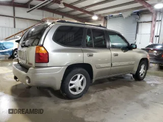 2002 GMC Envoy SLE with VIN 1GKDS13S622135607, listed as a Copart auction lot 84100254 with 298,811 mi miles and Salvage Title. Bid and sale history available at carsss.com. Image 3.