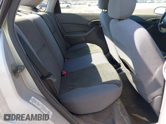2004 Ford Focus SE with VIN 1FAFP34394W120884, listed as a IAAI auction lot 41663180 with 213,972 mi miles and . Bid and sale history available at DreamBid. Image 8.