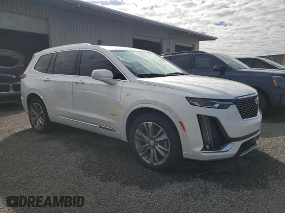 2021 Cadillac XT6 Premium Luxury z VIN 1GYKPCRSXMZ230618, wystawiony jako Copart lot #81022824 z przebiegiem Nie podano mil oraz Szkoda całkowita • Salvage title. Historia ofert i sprzedaży dostępna na DreamBid. Obrazek 4.
