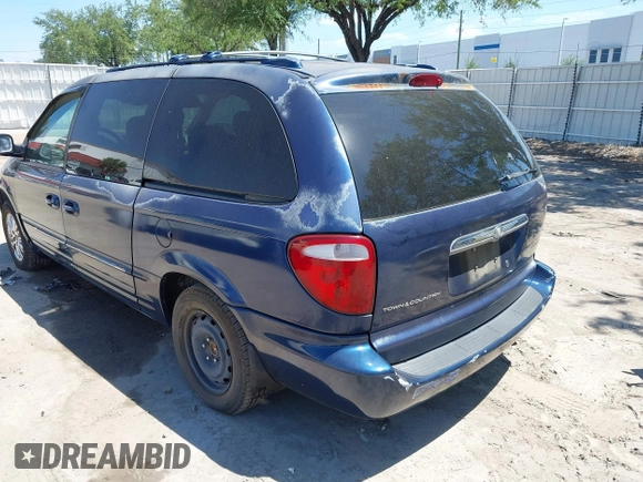 2002 Chrysler Town & Country Limited with VIN 2C8GP64LX2R611906, listed as a IAAI auction lot 42041345 with 166,896 mi miles. Bid and sale history available at carsss.com. Image 3.