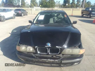 1997 BMW 5 Series 528iA with VIN WBADD6328VBW23350, listed as a IAAI auction lot 41707835 with 272,299 mi miles. Bid and sale history available at carsss.com. Image 6.