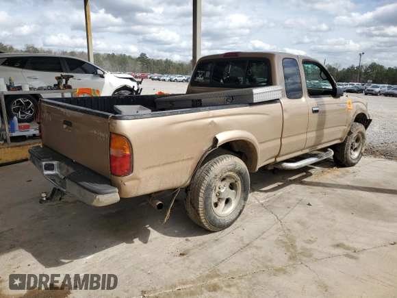 1999 Toyota Tacoma with VIN 4TAWN72NXXZ563507, listed as a Copart auction lot 49888575 with 387,818 mi miles and Salvage title. Bid and sale history available at DreamBid. Image 3.