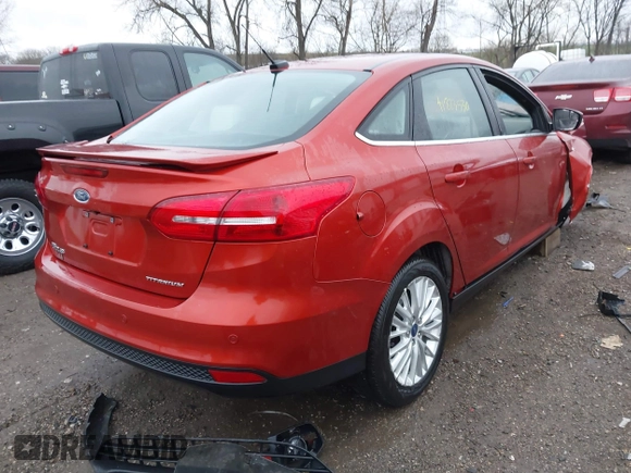 2018 Ford Focus Titanium with VIN 1FADP3J20JL280698, listed as a IAAI auction lot 41823530 with 54,841 mi miles and . Bid and sale history available at DreamBid. Image 4.