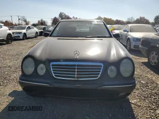 2002 Mercedes-Benz E-Class with VIN WDBJF70J82B492531, listed as a Copart auction lot 77485094 with 85,750 mi miles and Salvage Title. Bid and sale history available at carsss.com. Image 5.