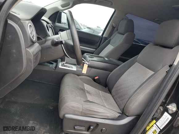 2015 Toyota Tundra 4WD Truck SR5 with VIN 5TFDW5F10FX424873, listed as a Copart auction lot 84812574 with 249,711 mi miles and Salvage Title. Bid and sale history available at carsss.com. Image 7.