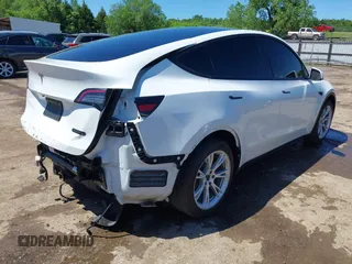 2020 Tesla Model Y Long Range z VIN 5YJYGDEE0LF035248, wystawiony jako IAAI lot #42162191 z przebiegiem 115 533 mil mil oraz . Historia ofert i sprzedaży dostępna na DreamBid. Obrazek 4.