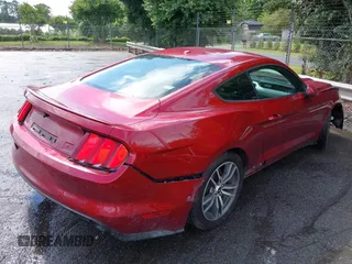 2017 Ford Mustang EcoBoost z VIN 1FA6P8TH7H5295141, wystawiony jako IAAI lot #42257611 z przebiegiem 66 490 mil mil oraz . Historia ofert i sprzedaży dostępna na DreamBid. Obrazek 4.