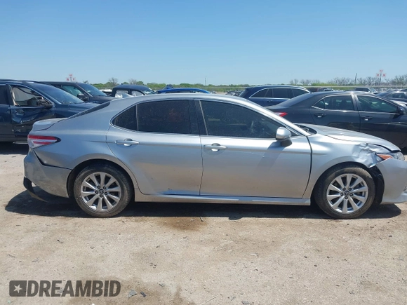 2019 Toyota Camry LE z VIN 4T1B11HK8KU789295, wystawiony jako IAAI lot #41993966 z przebiegiem 94 165 mil mil oraz . Historia ofert i sprzedaży dostępna na DreamBid. Obrazek 13.