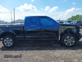 2018 Ford F-150 XL with VIN 1FTEX1EP5JKG01004, listed as a IAAI auction lot 42583232 with 123,258 mi miles and . Bid and sale history available at DreamBid. Image 13.