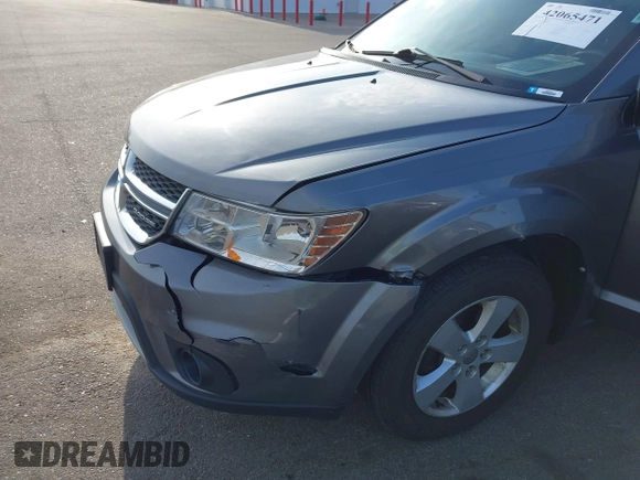2012 Dodge Journey SXT z VIN 3C4PDCBG9CT208092, wystawiony jako IAAI lot #42065471 z przebiegiem 208 794 mil mil oraz . Historia ofert i sprzedaży dostępna na DreamBid. Obrazek 6.