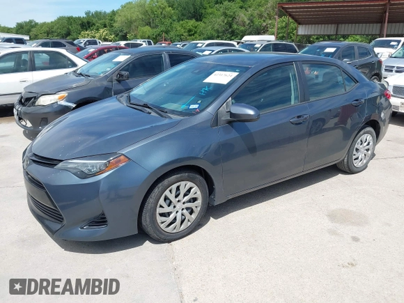 2018 Toyota Corolla L z VIN 5YFBURHE4JP820560, wystawiony jako IAAI lot #42317624 z przebiegiem 84 946 mil mil oraz . Historia ofert i sprzedaży dostępna na DreamBid. Obrazek 17.