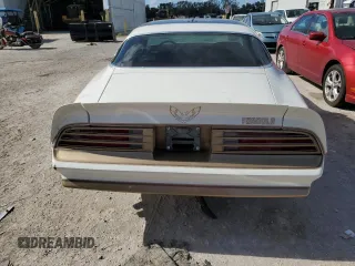 1978 Pontiac Firebird z VIN 2U87K8L123850, wystawiony jako Copart lot #79076374 z przebiegiem 64 829 mil mil oraz Szkody całkowita. Historia ofert i sprzedaży dostępna na DreamBid. Obrazek 6.