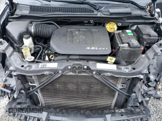 2014 Chrysler Town & Country Touring L 30th Anniversary with VIN 2C4RC1CG5ER277141, listed as a Copart auction lot 49679315 with 106,167 mi miles and Salvage Title. Bid and sale history available at DreamBid. Image 12.