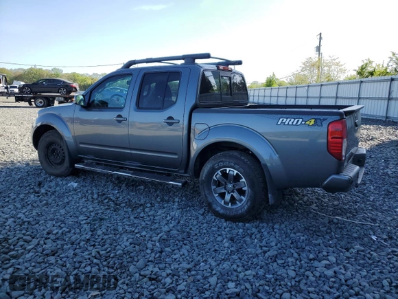 2016 Nissan Frontier Pro-4X with VIN 1N6AD0EVXGN702673, listed as a Copart auction lot 54716865 with 81,258 mi miles and Salvage title. Bid and sale history available at DreamBid. Image 2.