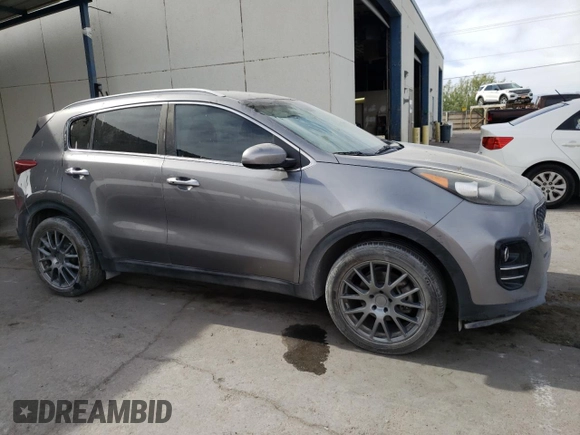 2017 Kia Sportage EX with VIN KNDPN3ACXH7161193, listed as a Copart auction lot 65339004 with 137,011 mi miles and Salvage title. Bid and sale history available at DreamBid. Image 4.
