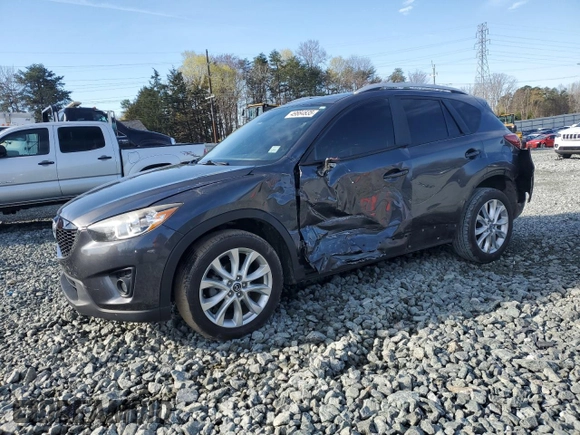 2014 Mazda CX-5 Grand Touring with VIN JM3KE2DY4E0323603, listed as a Copart auction lot 49884835 with 0 mi miles and Salvage Title. Bid and sale history available at carsss.com. Image 1.