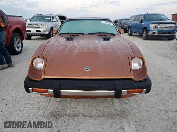 1981 Datsun 280ZX z VIN JN1HZ04SXBX259192, wystawiony jako Copart lot #77847764 z przebiegiem 91 619 mil mil oraz Szkody całkowita. Historia ofert i sprzedaży dostępna na DreamBid. Obrazek 5.