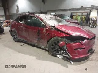 2023 Tesla Model X with VIN 7SAXCDE51PF403632, listed as a IAAI auction lot 41328722 with Not Provided miles and . Bid and sale history available at DreamBid. Image 1.