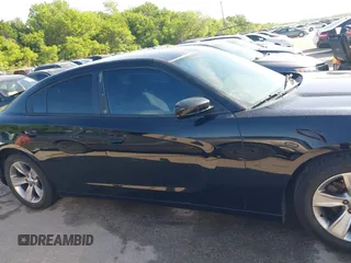 2016 Dodge Charger SXT with VIN 2C3CDXHG8GH354631, listed as a IAAI auction lot 42036201 with 196,344 mi miles and . Bid and sale history available at carsss.com. Image 13.