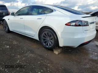 2017 Tesla Model S 100D с VIN 5YJSA1E26HF212985, выставлен на аукционе Copart как лот 46702705 с пробегом 58 179 миль миль и Списание • Salvage title. История ставок и продаж доступна на DreamBid. Изображение 2.