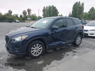 2016 Mazda CX-5 Sport с VIN JM3KE2BY2G0856071, выставлен на аукционе IAAI как лот 42473128 с пробегом 57 250 миль миль и . История ставок и продаж доступна на DreamBid. Изображение 17.