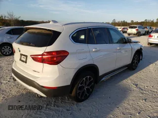 2020 BMW X1 xDrive28i with VIN WBXJG9C02L3L57542, listed as a Copart auction lot 67003112 with 18,619 mi miles. Bid and sale history available at carsss.com. Image 4.