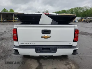 2016 Chevrolet Silverado 1500 LT with VIN 3GCUKREC1GG341223, listed as a Copart auction lot 56547195 with 180,189 mi miles and Salvage Title. Bid and sale history available at DreamBid. Image 6.