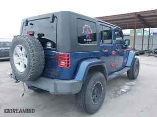 2010 Jeep Wrangler Unlimited Sport with VIN 1J4BA3H18AL105500, listed as a IAAI auction lot 41634465 with 230,453 mi miles. Bid and sale history available at carsss.com. Image 4.