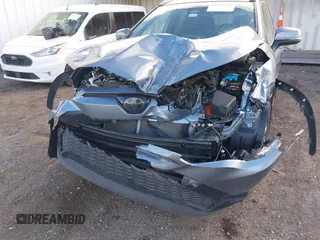 2023 Toyota Corolla Cross Hybrid S with VIN 7MUFBABG3PV005338, listed as a IAAI auction lot 41633311 with 32,082 mi miles and . Bid and sale history available at DreamBid. Image 6.