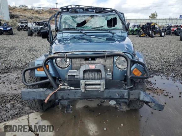 1998 Jeep Wrangler Sport z VIN 1J4FY19S8WP788484, wystawiony jako Copart lot #50835275 z przebiegiem Nie podano mil oraz Szkoda całkowita • Salvage title. Historia ofert i sprzedaży dostępna na DreamBid. Obrazek 5.