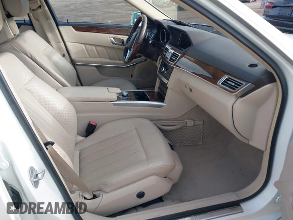 2014 Mercedes-Benz E 550 Sport with VIN WDDHF9BB5EA949457, listed as a IAAI auction lot 41128583 with 99,248 mi miles and . Bid and sale history available at DreamBid. Image 5.