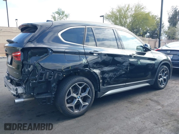 2019 BMW X1 sDrive28i with VIN WBXHU7C59K5L12320, listed as a IAAI auction lot 42116860 with 28,183 mi miles and . Bid and sale history available at DreamBid. Image 6.