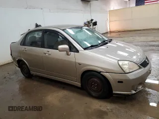 2006 Suzuki Aerio z VIN JS2RB61S865300102, wystawiony jako Copart lot #47967855 z przebiegiem 127 267 mil mil oraz Czysty tytuł • Clean title. Historia ofert i sprzedaży dostępna na DreamBid. Obrazek 4.