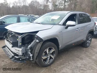 2021 Toyota RAV4 Prime SE with VIN JTMCB3FV4MD057893, listed as a IAAI auction lot 41876297 with 62,666 mi miles. Bid and sale history available at carsss.com. Image 18.