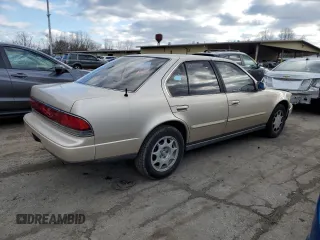 1990 Nissan Maxima z VIN JN1HJ01P8LT402950, wystawiony jako Copart lot #82714734 z przebiegiem 60 727 mil mil oraz Tytuł czysty. Historia ofert i sprzedaży dostępna na DreamBid. Obrazek 3.