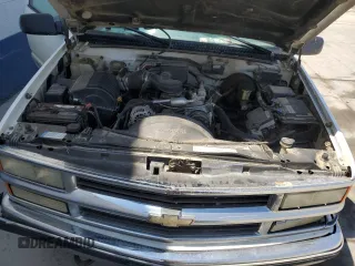 1999 Chevrolet Suburban with VIN 3GNFK16R4XG190883, listed as a Copart auction lot 58324415 with 228,782 mi miles and Salvage title. Bid and sale history available at DreamBid. Image 11.