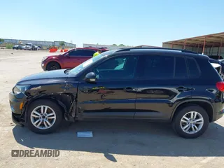 2015 Volkswagen Tiguan SE with VIN WVGAV7AX1FW558855, listed as a IAAI auction lot 42064427 with 58,584 mi miles and . Bid and sale history available at DreamBid. Image 14.