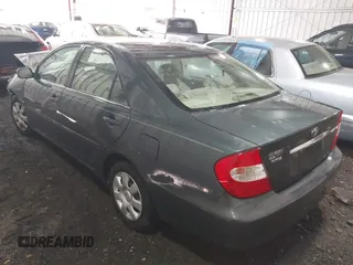 2004 Toyota Camry LE with VIN 4T1BE30K54U377818, listed as a IAAI auction lot 41931027 with 212,690 mi miles. Bid and sale history available at carsss.com. Image 3.