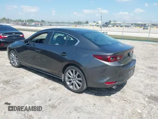 2023 Mazda 3 S Preferred with VIN 3MZBPACM8PM361196, listed as a IAAI auction lot 41940018 with 49,759 mi miles and . Bid and sale history available at DreamBid. Image 3.