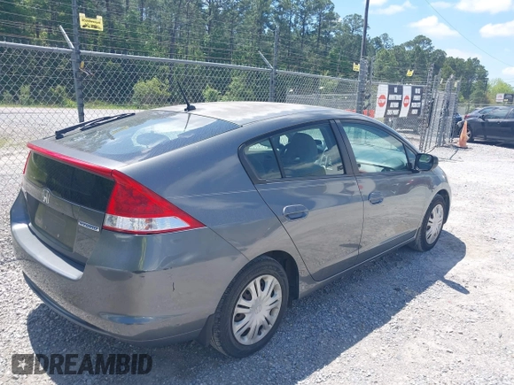 2010 Honda Insight LX with VIN JHMZE2H56AS002473, listed as a IAAI auction lot 41983606 with Not Provided miles and . Bid and sale history available at DreamBid. Image 4.