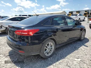 2018 Ford Focus SE z VIN 1FADP3F22JL265175, wystawiony jako Copart lot #62916255 z przebiegiem 90 348 mil mil oraz Szkoda całkowita • Salvage title. Historia ofert i sprzedaży dostępna na DreamBid. Obrazek 3.