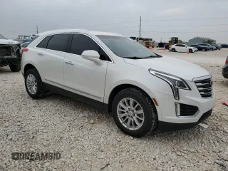 2017 Cadillac XT5 FWD with VIN 1GYKNARS0HZ314818, listed as a Copart auction lot 51158785 with 87,091 mi miles and Clean title. Bid and sale history available at DreamBid. Image 4.