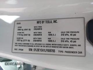 2020 Tesla Model 3 Standard Range Plus with VIN 5YJ3E1EA1LF659765, listed as a IAAI auction lot 41834411 with 42,433 mi miles and . Bid and sale history available at carsss.com. Image 9.