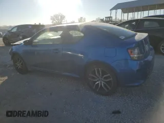 2015 Scion tC with VIN JTKJF5C72FJ012056, listed as a Copart auction lot 83813504 with 131,014 mi miles and Salvage Title. Bid and sale history available at carsss.com. Image 2.