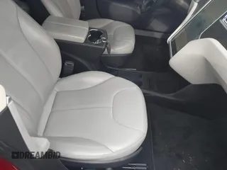 2013 Tesla Model S with VIN 5YJSA1CN1DFP09756, listed as a IAAI auction lot 41921720 with 94,770 mi miles. Bid and sale history available at carsss.com. Image 5.